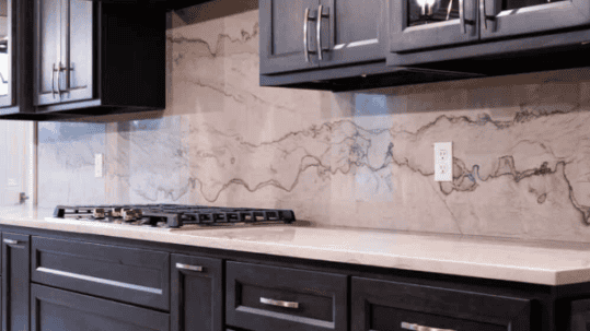 Comparison of cabinet refinishing versus cabinet replacement in a modern kitchen setting.